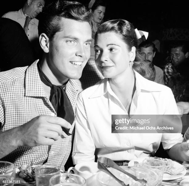 Actor Jeffrey Hunter and guest attend the Boomtown party at Ciro's in Los Angeles,California.