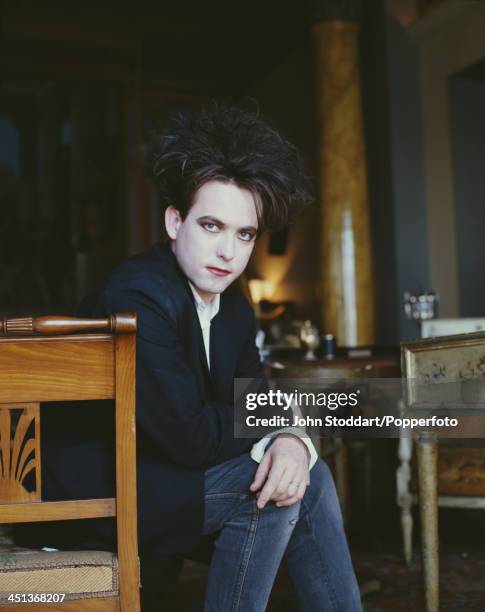 English musician and lead singer/songwriter of rock band The Cure, Robert Smith, circa 1995.