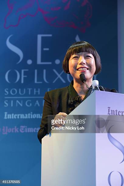 Angelica Cheung, Editor in Chief, Vogue China speaks on stage at the International New York Times Luxury Conference on November 21, 2013 in...