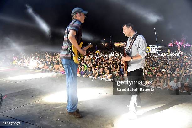 Jake Cinninger and Brendan Bayliss of Umphrey's McGee perform during Day 2 of the 2014 Electric Forest Festival on June 27, 2014 in Rothbury,...