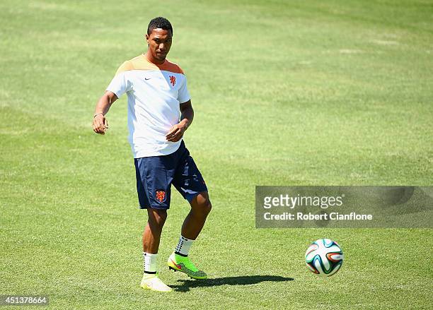 Jonathan de Guzman of the Netherlands kicks the ball during the Netherlands training session at the 2014 FIFA World Cup Brazil held at Estadio...
