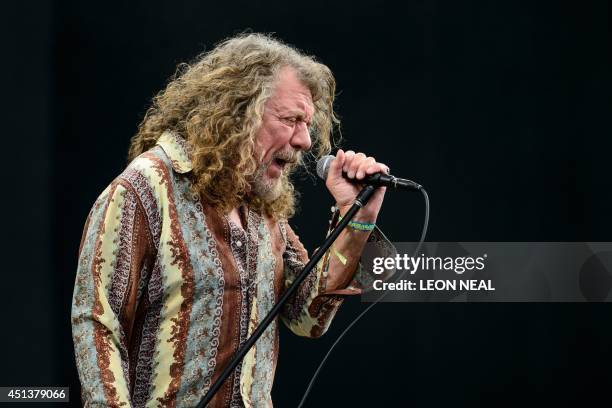 British singer Robert Plant performs on the Pyramid Stage, on the second day of the Glastonbury Festival of Music and Performing Arts in Somerset,...