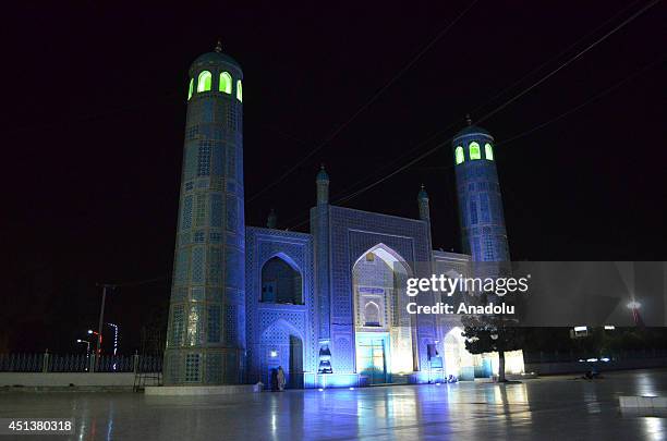 Muslims perform evening prayer called "tarawih" on the eve of the first day of the Ramadan at the Blue Mosque also known as The Shrine of Hazrat Ali...