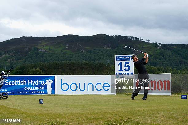 Jason Barnes of England tees of at the fifteenth on day three of the 2014 Scottish Hydro Challenge hosted by MacDonald Hotels & Resorts at Spey...