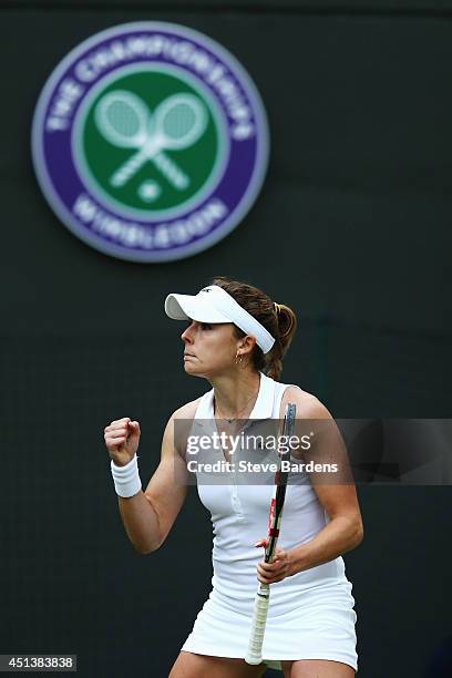 Alize Cornet of France celebrates during her Ladies' Singles third round match against Serena Williams of the United States on day six of the...