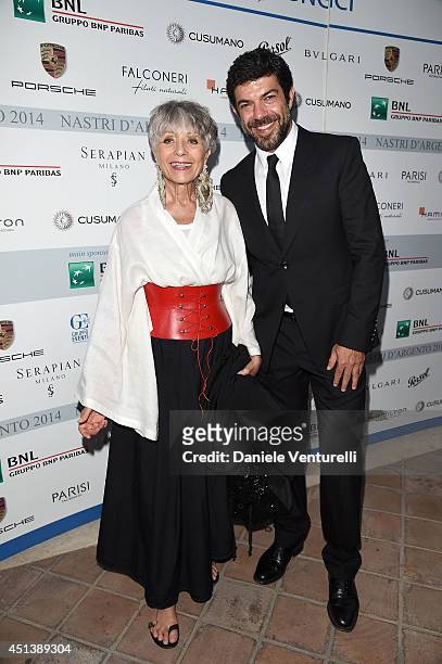 Erminia Ferrari and Pierfrancesco Favino attend the Nastri D'Argento Awards 2014 Cocktail on June 28, 2014 in Taormina, Italy.
