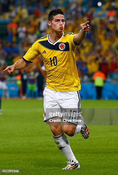 James Rodriguez of Colombia celebrates scoring his team's second goal and his second of the game during the 2014 FIFA World Cup Brazil round of 16...