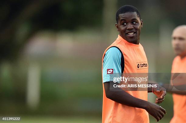 Costa Rica's forward Joel Campbell smiles during a training session at the Wilson Campos training center in Recife on June 28 a day before their...