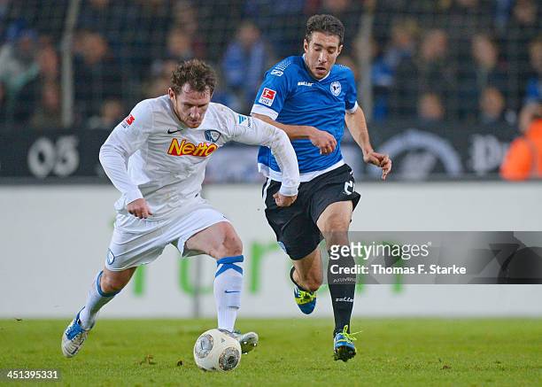 Paul Freier of Bochum and Patrick Schoenfeld of Bielefeld fight for the ball during the Second Bundesliga match between Arminia Bielefeld and VfL...