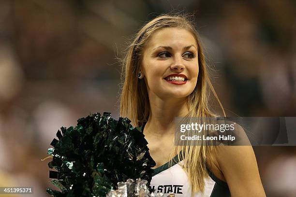 Michigan State Spartans dance team member performs during the game against the Columbia Lions at the Breslin Center on November 15, 2013 in East...