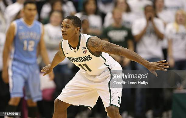 Keith Appling of the Michigan State Spartans defends during the second half of the game against the Columbia Lions during the second half of the game...