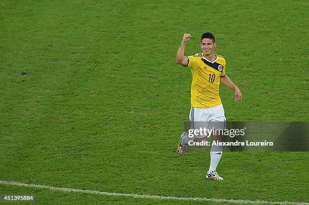 James Rodriguez of Colombia celebrates scoring his team's second goal and his second of the game during the 2014 FIFA World Cup Brazil round of 16...