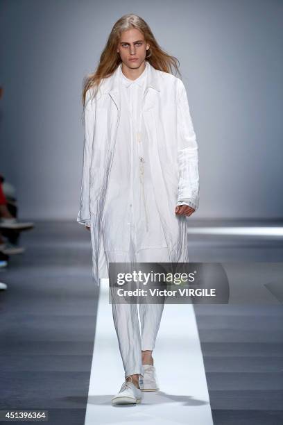 Model walks the runway during the Ann Demeulemeester show as part of the Paris Fashion Week Menswear Spring/Summer 2015 on June 27, 2014 in Paris,...