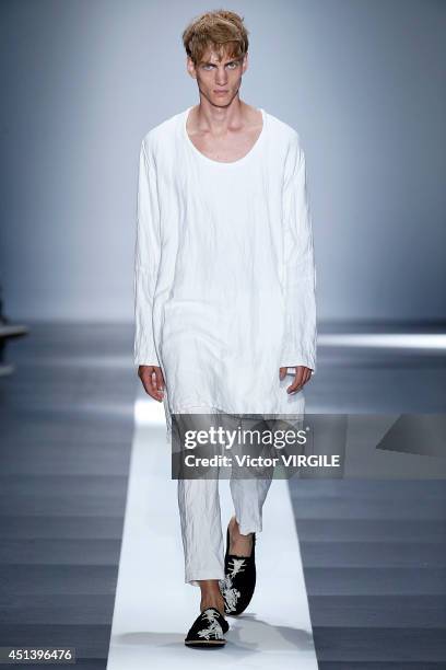 Model walks the runway during the Ann Demeulemeester show as part of the Paris Fashion Week Menswear Spring/Summer 2015 on June 27, 2014 in Paris,...