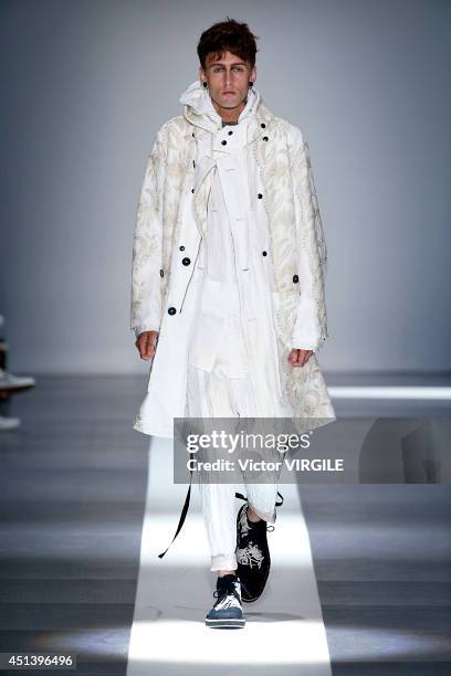 Model walks the runway during the Ann Demeulemeester show as part of the Paris Fashion Week Menswear Spring/Summer 2015 on June 27, 2014 in Paris,...