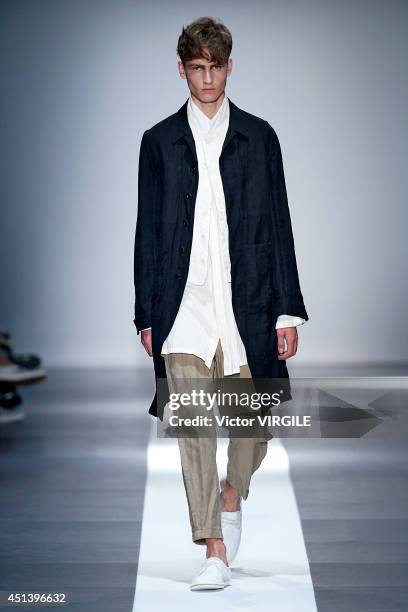 Model walks the runway during the Ann Demeulemeester show as part of the Paris Fashion Week Menswear Spring/Summer 2015 on June 27, 2014 in Paris,...