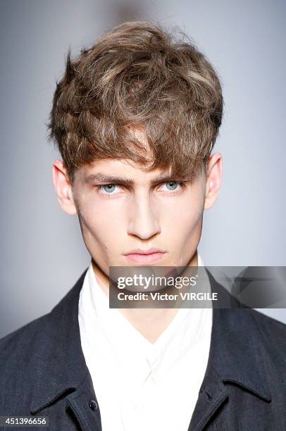 Model walks the runway during the Ann Demeulemeester show as part of the Paris Fashion Week Menswear Spring/Summer 2015 on June 27, 2014 in Paris,...