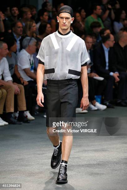 Model walks the runway during the Givenchy show as part of the Paris Fashion Week Menswear Spring/Summer 2015 on June 27, 2014 in Paris, France.