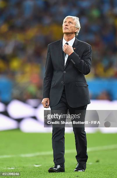 Head coach Jose Pekerman of Colombia looks on during the 2014 FIFA World Cup Brazil Round of 16 match between Colombia and Uruguay at Maracana on...