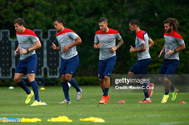 The US Men's National Team stretches during training at Sao Paulo FC on June 28, 2014 in Sao Paulo, Brazil.