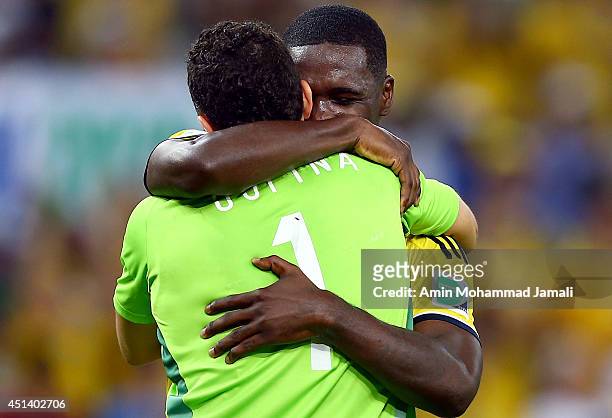 Cristian Zapata and David Ospina of Colombia Celebrate after defeating Uruguay 2-0 during the 2014 FIFA World Cup Brazil round of 16 match between...