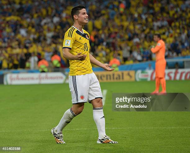 James Rodriguez of Colombia reacts after scoring a goal during the World Cup round of 16 soccer match between Colombia and Uruguay at the Maracana...