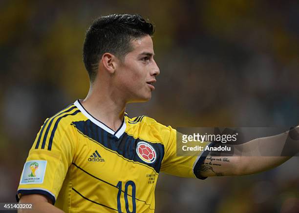 James Rodriguez of Colombia reacts after scoring a goal during the World Cup round of 16 soccer match between Colombia and Uruguay at the Maracana...