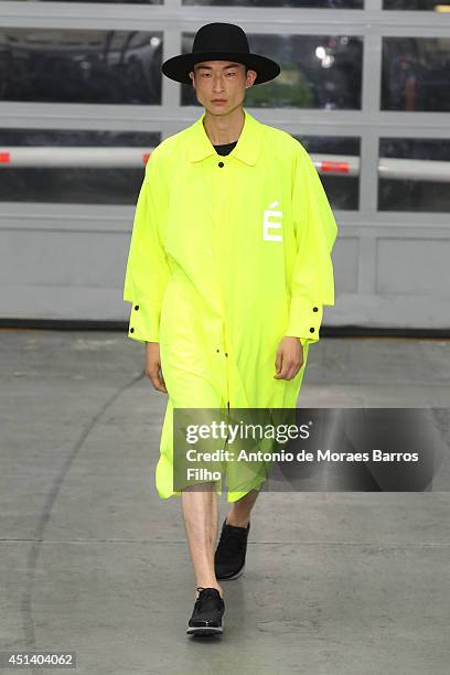 Model walks the runway during the Etudes Studio show as part of the Paris Fashion Week Menswear Spring/Summer 2015 on June 28, 2014 in Paris, France.