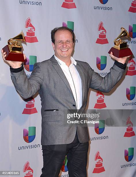 Producer Julio Reyes Copello poses backstage during The 14th Annual Latin GRAMMY Awards at the Mandalay Bay Events Center on November 21, 2013 in Las...