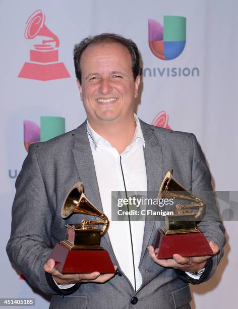 Producer Julio Reyes Copello poses backstage during The 14th Annual Latin GRAMMY Awards at the Mandalay Bay Events Center on November 21, 2013 in Las...