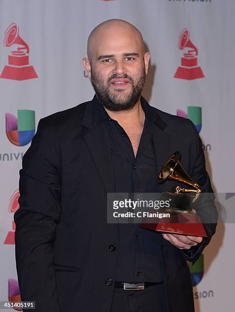 Recording artist Papayo pose backstage during The 14th Annual Latin GRAMMY Awards at the Mandalay Bay Events Center on November 21, 2013 in Las...