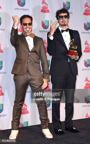 Recording artists Emmanuel Horvilleur and Dante Spinetta of Illya Kuryaki and the Valderramas pose backstage during The 14th Annual Latin GRAMMY...