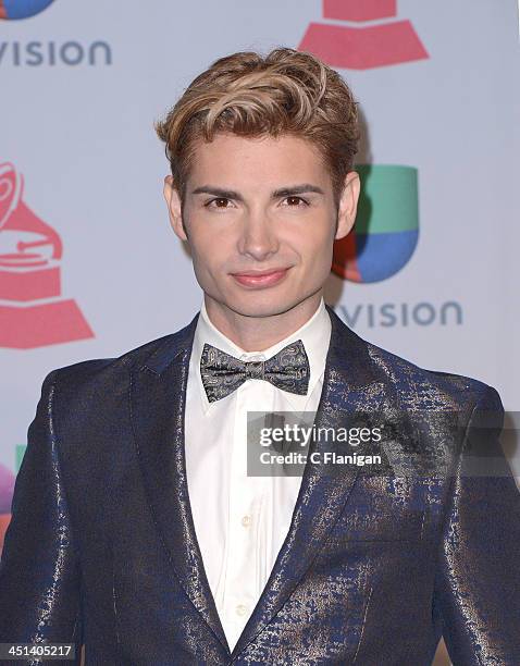 Actor Christian Acosta poses backstage during The 14th Annual Latin GRAMMY Awards at the Mandalay Bay Events Center on November 21, 2013 in Las...