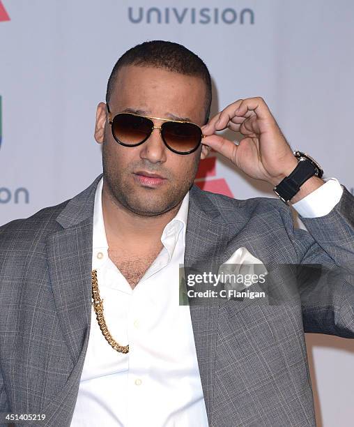 Recording artist El Cata poses backstage during The 14th Annual Latin GRAMMY Awards at the Mandalay Bay Events Center on November 21, 2013 in Las...