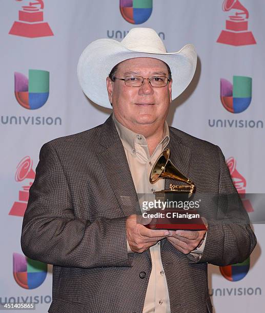 Musician David Lee Garza, winner of Best Tejano Album for 'Just Friends,' pose backstage during the 14th Annual Latin GRAMMY Awards at Mandalay Bay...