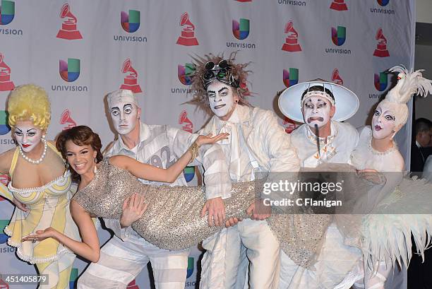 Members of Zarkana Cirque du Soleil and Singer Leslie Grace arrives at the 14th Annual Latin GRAMMY Awards at Mandalay Bay Events Center on November...