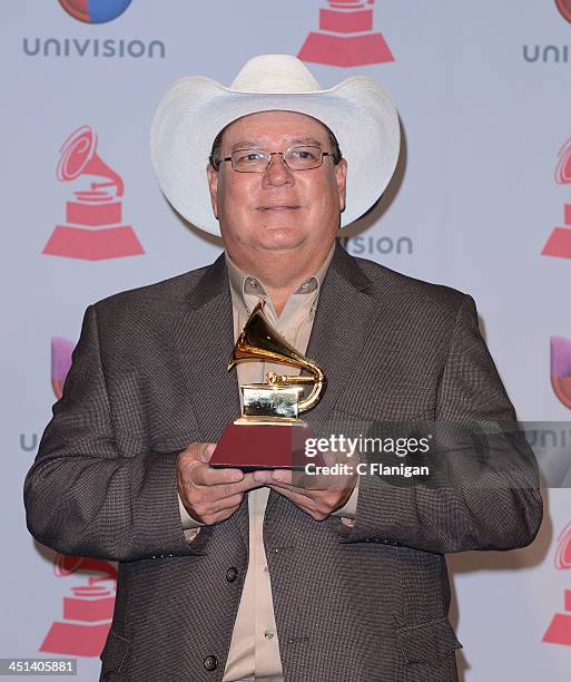 Musician David Lee Garza, winner of Best Tejano Album for 'Just Friends,' pose backstage during the 14th Annual Latin GRAMMY Awards at Mandalay Bay...