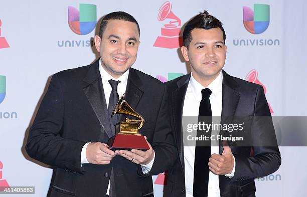 Musicians Felipe Pelaez and Manuel Julian, winners of Best Cumbia/Vallenato Album for 'Diferente,' pose backstage during the 14th Annual Latin GRAMMY...