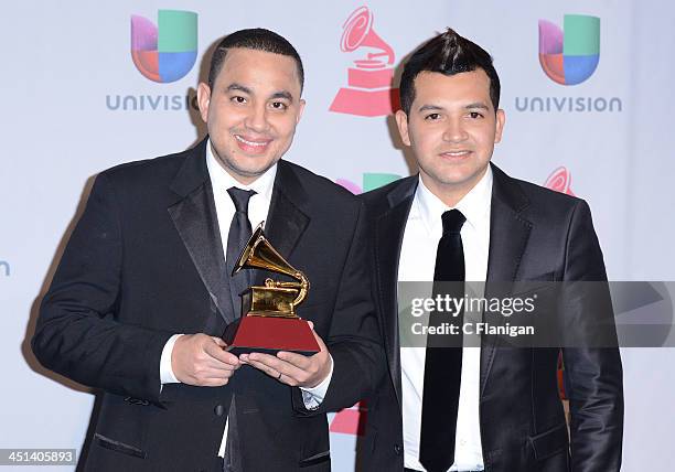 Musicians Felipe Pelaez and Manuel Julian, winners of Best Cumbia/Vallenato Album for 'Diferente,' pose backstage during the 14th Annual Latin GRAMMY...