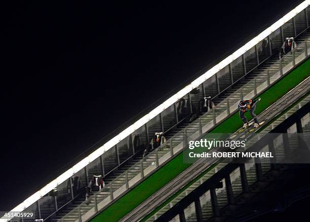 Gregor Schlierenzauer of Austria competes during the qualifying of the FIS Ski Jumping World Cup on November 22, 2013 in Klingenthal, eastern...