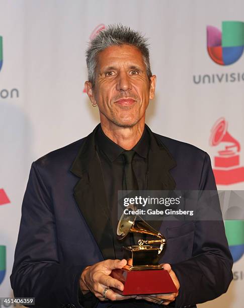 Songwriter Cachorro Lopez, winner of Best Rock Song for "Creo Que Me Enamore" poses in the press room during The 14th Annual Latin GRAMMY Awards at...