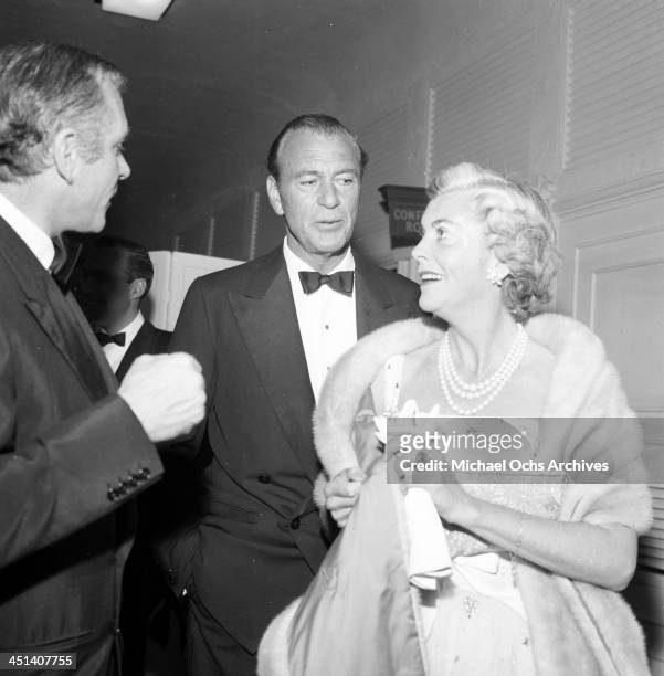 Actor Gary Cooper and his wife Veronica Balfe attend a party in Los Angeles,California.