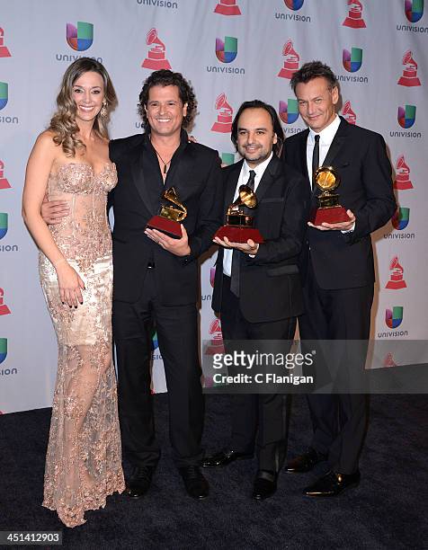 Claudia Vasquez, Singer Carlos Vives and Andres Castro pose backstage at the 14th Annual Latin GRAMMY Awards at Mandalay Bay Events Center on...