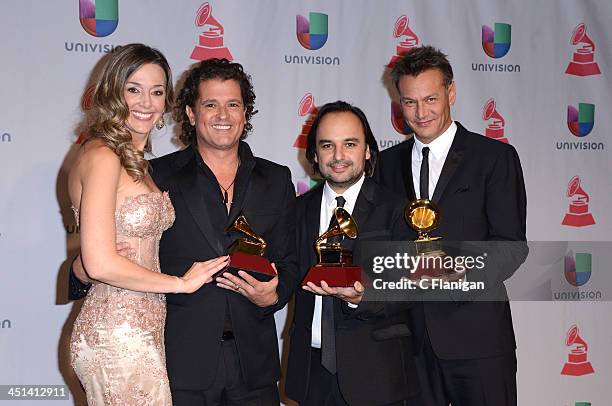 Claudia Vasquez, Singer Carlos Vives and Andres Castro pose backstage at the 14th Annual Latin GRAMMY Awards at Mandalay Bay Events Center on...