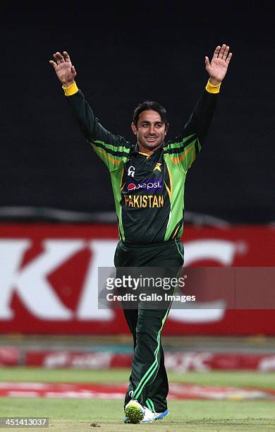 Saeed Ajmal of Pakistan celebrates getting Hashim Amla of South Africa wicket during the 2nd T20 International match between South Africa and...