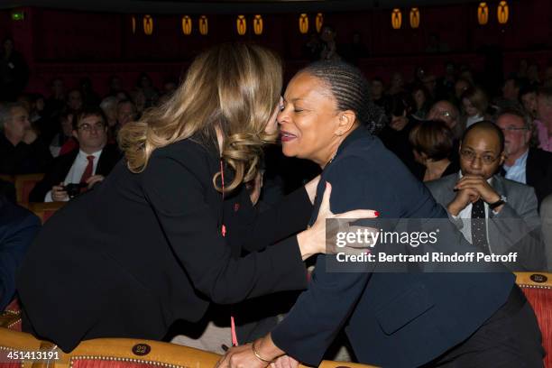 Valerie Trierweiler, the companion of French President Francois Hollande, kisses French Justice Minister Christiane Taubira during the award giving...