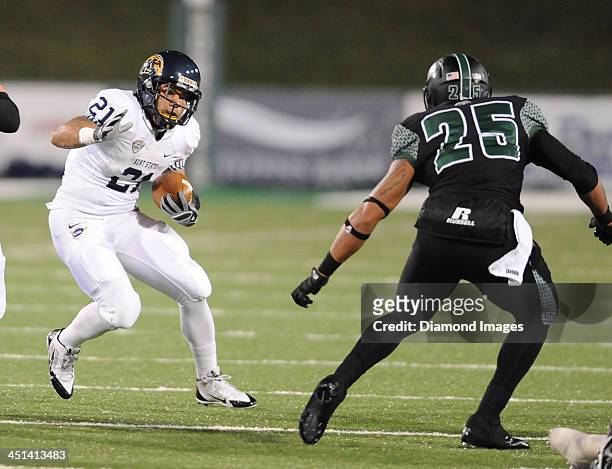 Running back Anthony Meray of the Kent State Golden Flashes runs the football during a game against the Ohio Bobcats at Peden Stadium in Athens,...
