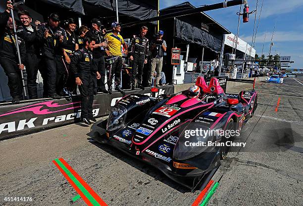 Alex Brundle arrives on pit road after winning the pole position for the Sahlen's Six Hours Of The Glen at Watkins Glen International on June 28,...