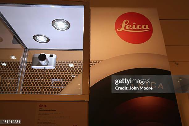 Custom one of a kind Jonny Ive and Marc Newsom designed Leica rangefinder camera is displayed ahead of auction at Sotheby's November 22, 2013 in New...