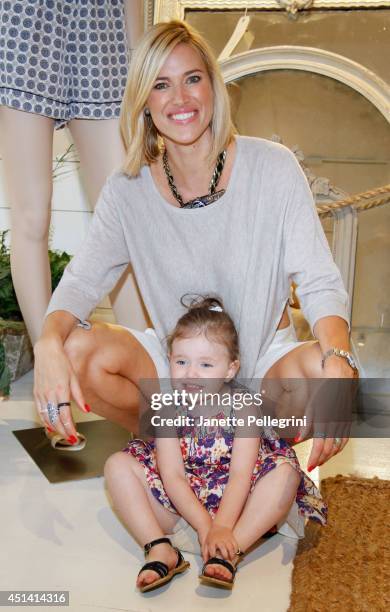 Kristen Taekman and Kingsley Taekman attend Hampton Magazine Celebration of The Club Monaco Southampton Store Opening on June 28, 2014 in Southampton.